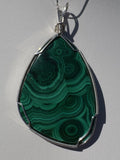 Malachite wrapped in Sterling Silver